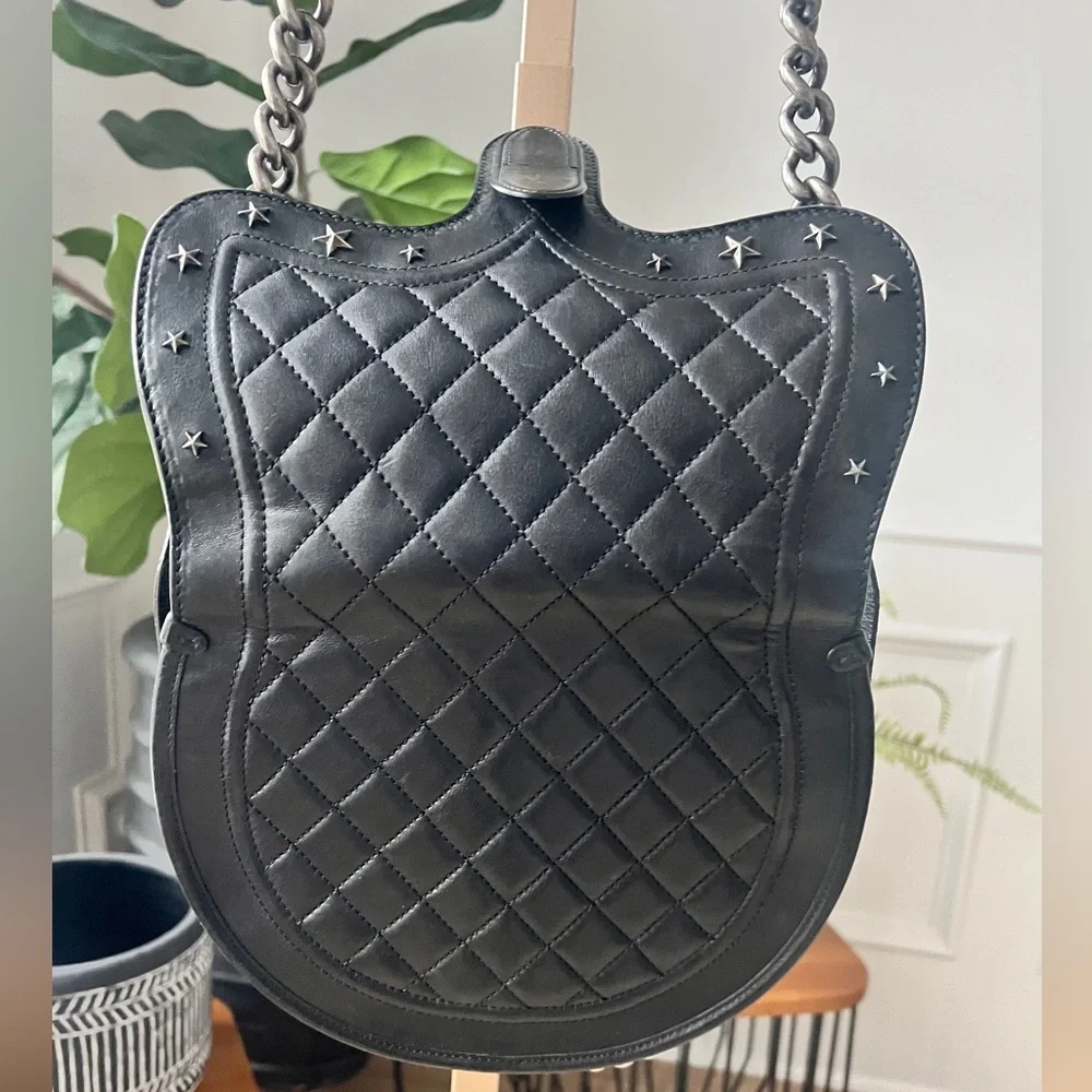 CHANEL Black Quilted & Fur Star-Studded Saddle Bag